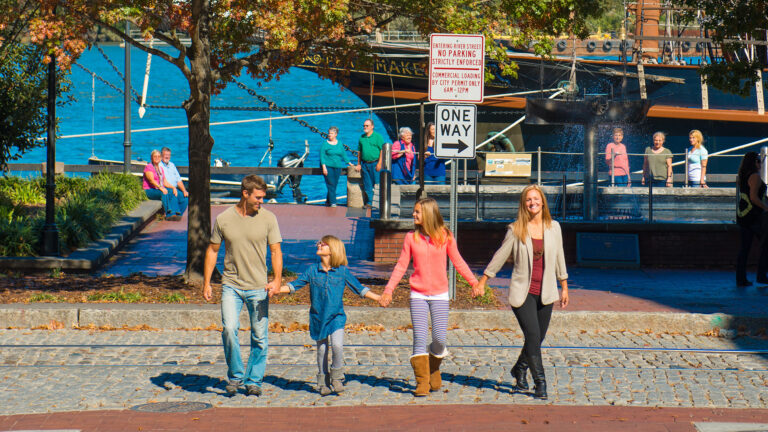 family along the riverwalk in savannah